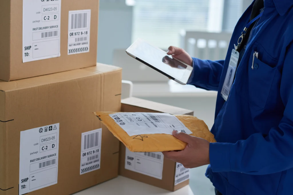 Warehouse teamworker examining reduced ecommerce warranty claims